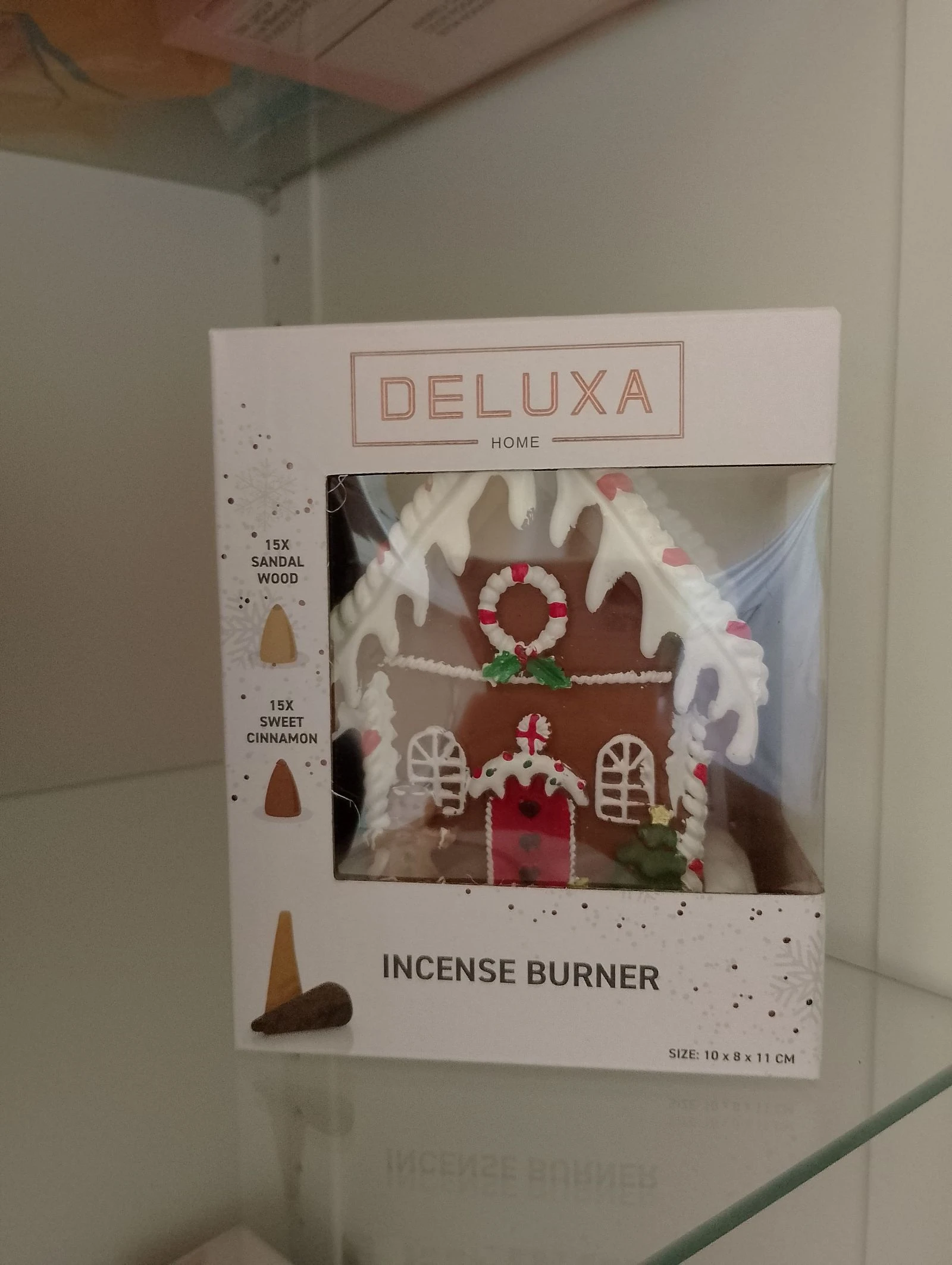 Casa de Navidad con incienso 